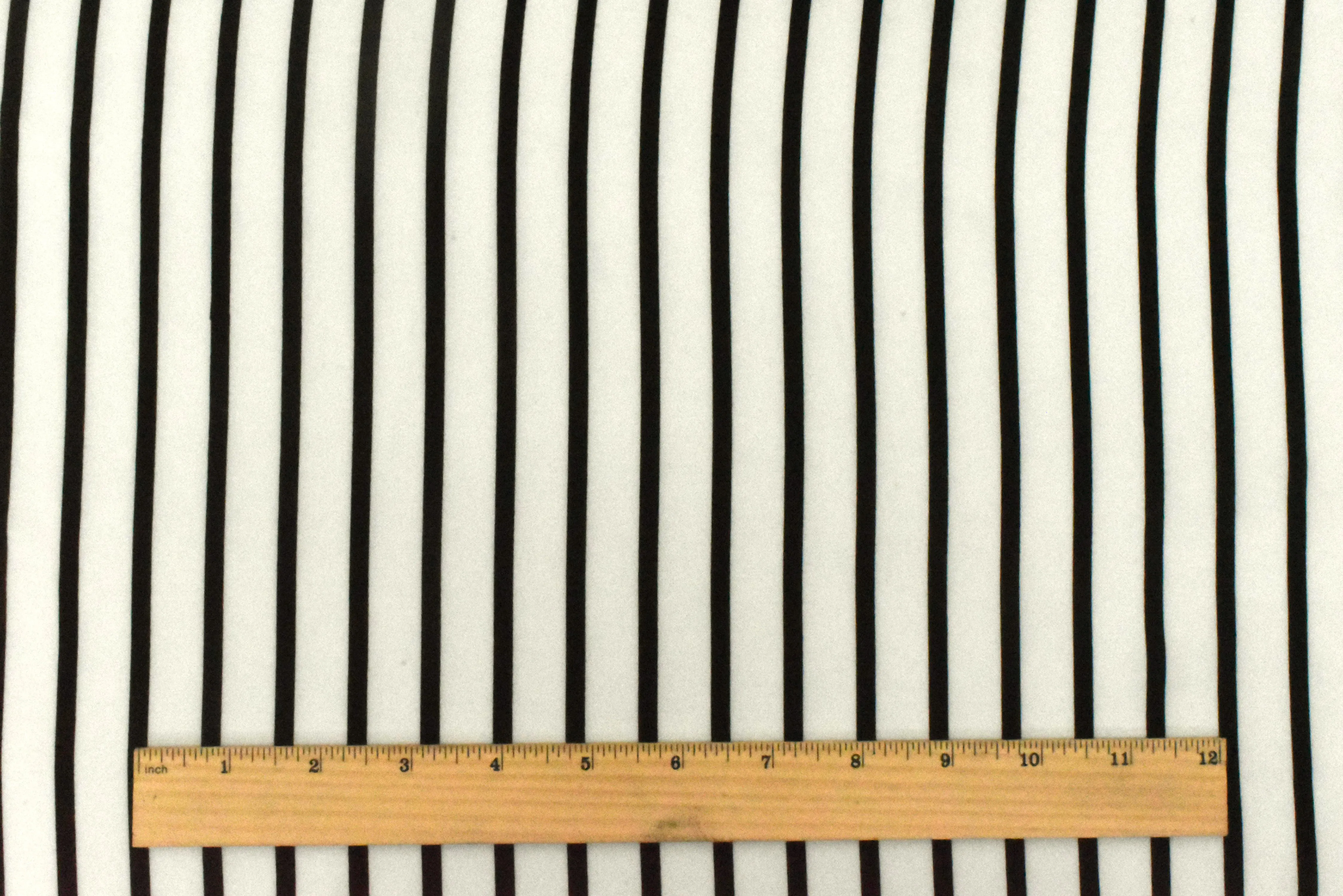 Black-Ivory Stripe Printed Polyester Georgette Woven Fabric